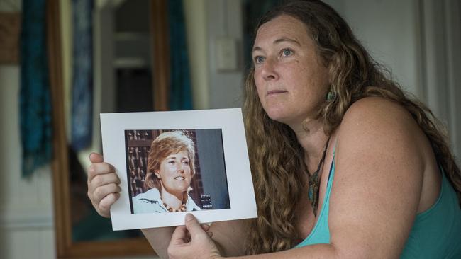 Shanelle Dawson, who has written a memoir entitled My Mother’s Eyes, and is interviewed in a new episode of podcast The Teacher’s Accuser, holding a pcture of her mother Lynette. Picture: John Wilson