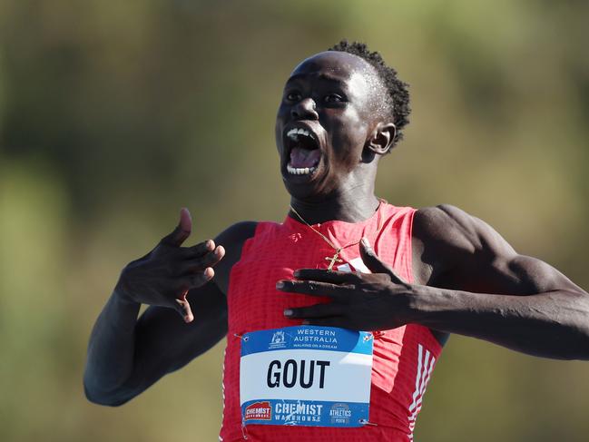 PERTH, AUSTRALIA - APRIL 13: Gout Gout of Queensland celebrates winning the Men's 200m Final during the 2025 Australian Open and Under 20 Athletics Championships at WA Athletics Stadium on April 13, 2025 in Perth, Australia. (Photo by Paul Kane/Getty Images) *** BESTPIX ***