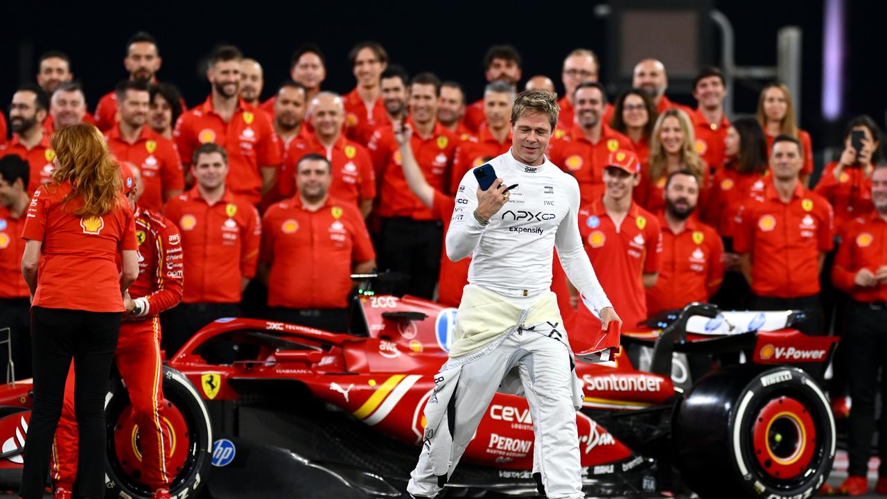 Brad Pitt, star of the upcoming Formula One based movie, F1, poses with Ferrari before the Abu Dhabi Grand Prix. (Photo by Clive Mason/Getty Images)