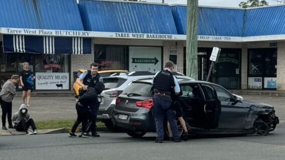 Police make an arrest at Taree West on Wednesday. Picture: Facebook.