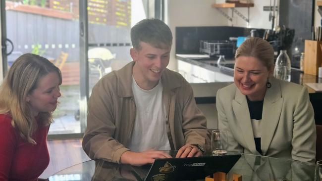 Labor Clark candidate Heidi Heck with graduate Liam Mclaren and Labor Franklin candidate Julie Collins at South Hobart on Wednesday, April 30, 2025.