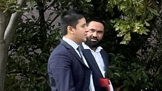 Matthew Smyth (Right), leaving with his lawyer (Left) outside Hornsby Local Court after pleading guilty to assault and intimidation charges.