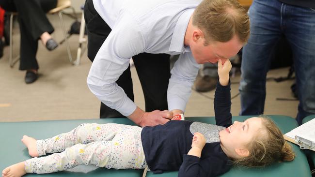 Stephanie getting rehab sessions at the Royal Children’s Hospital in Melbourne, with her father Mark helping. Picture: Alex Coppel 