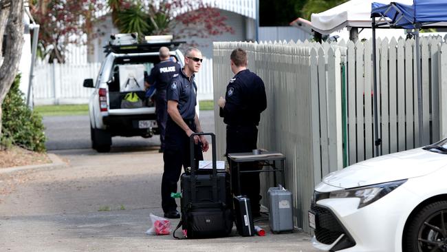 A crime scene was set up at an address on Ronald St, Wynnum, after a man’s body was found. Picture: Steve Pohlner