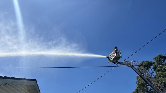 A primary school has evcuated after a nearby house caught alight. Picture: FRNSW