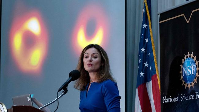 Professor of astronomy and physics Feryal Ozel at a news conference to announce the first image of Sagittarius A* (on screen). Picture: Jose Luis Magana/AFP