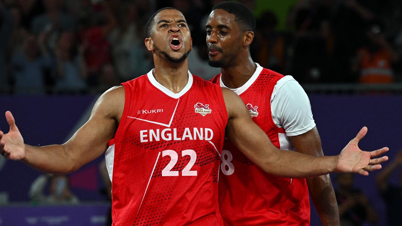 England's Myles Edward Sinclair Hessen (L) and Jamell Anderson celebrate.