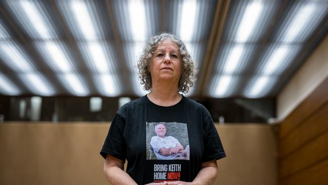 Former Hamas hostage Aviva Siegel poses with a t-shirt showing a picture of her husband Keith Siegel. Picture: Fabrice Coffrini/AFP