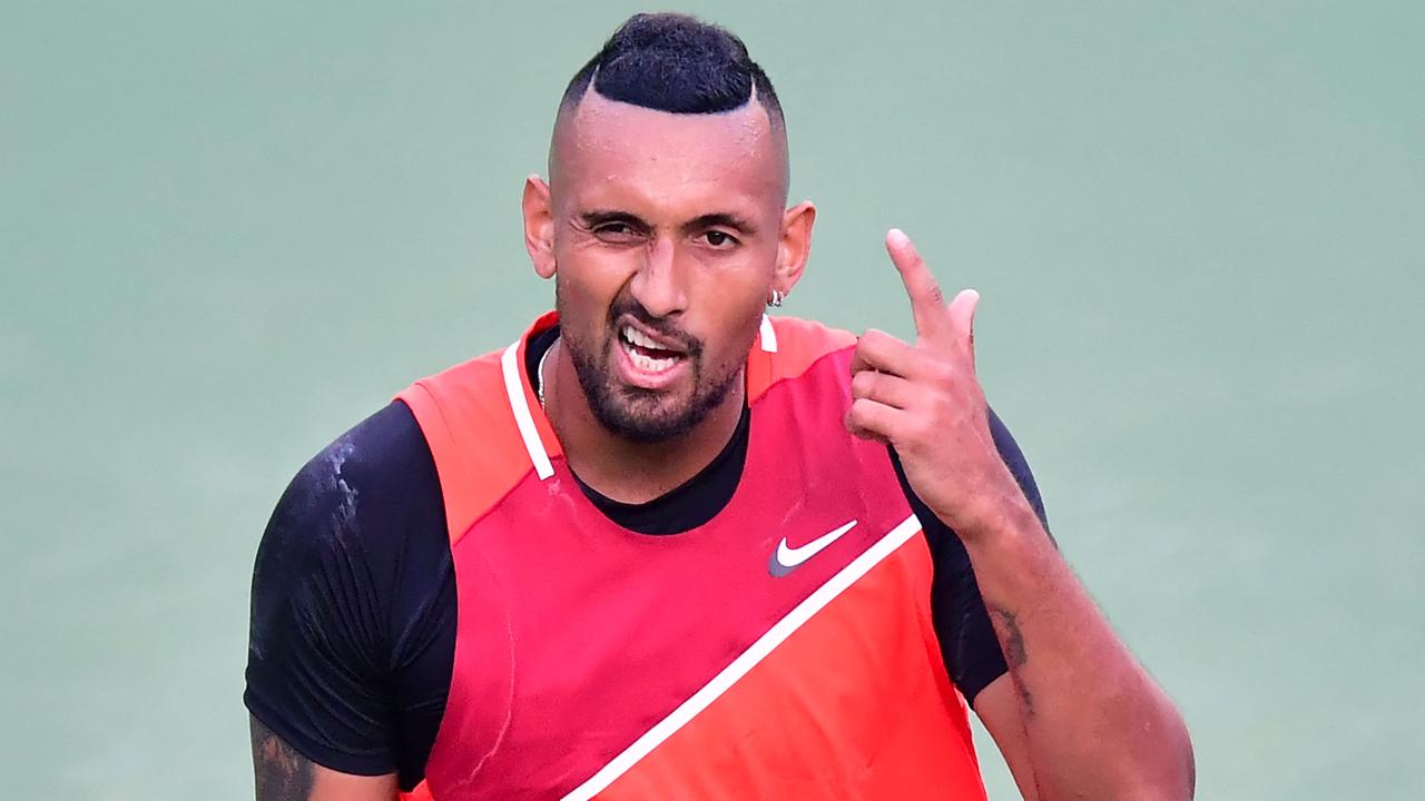 Nick Kyrgios of Australia reacts to a lost point against Rafael Nadal of Spain in their ATP quarterfinal match at the Indian Wells tennis tournament on March 17, 2022 in Indian Wells, California. - Nadal defeated Kyrgios 7-6(0), 5-7, 6-4. (Photo by Frederic J. BROWN / AFP)