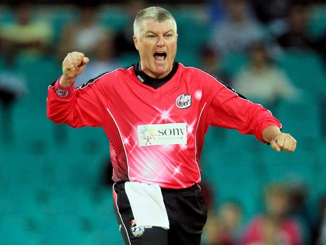 Stuart MacGill bowls for the Sydney Sixers in 2011.