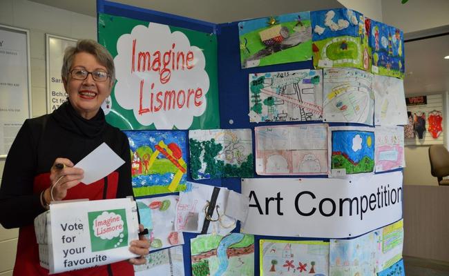 Lismore mayor, Jenny Dowell, takes a look at the entries in the 'Imagine Lismore' school art competition. Picture: LCC