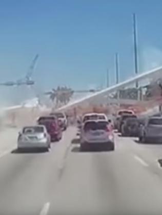 Traffic screeches to a halt as the bridge crumbles. Picture: OfficalJoelF/YouTube