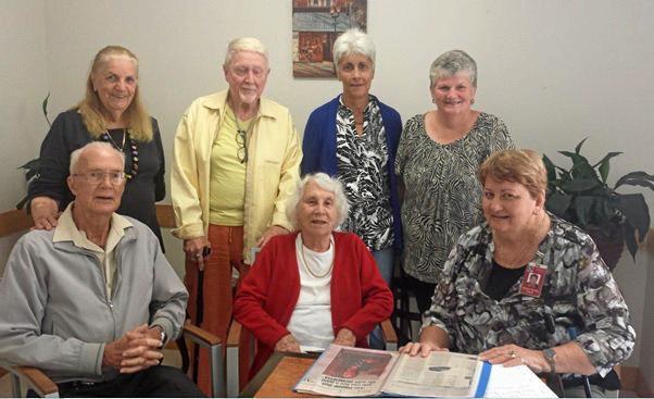 Cooinda CEO Robyn Kross (seated right) with (back from left) Vi Brennan, James Kundatt, Sheree Fuller, Bronwyn Kernick, (front) Bill Mason and Marjorie Head.