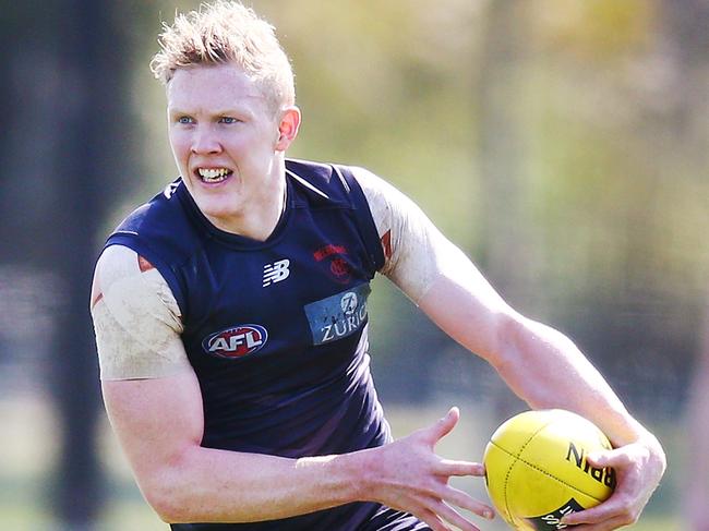 MELBOURNE, AUSTRALIA - SEPTEMBER 11:  Clayton Oliver of the Demons runs with the ball during a Melbourne Demons AFL training session at Gosch's Paddock on September 11, 2018 in Melbourne, Australia.  (Photo by Michael Dodge/Getty Images)