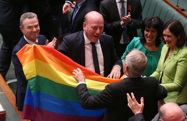 Trent Zimmerman with ex-PM Malcolm Turnbull after the Same Sex Marriage Bill passes in the House of Representatives. Picture: Kym Smith