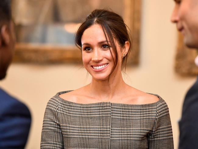 Britain’s Prince Harry’s fiancée Meghan Markle chats with people inside the Drawing Room during a visit at Cardiff Castle in Cardiff, south Wales on January 18, 2018, for a day showcasing the rich culture and heritage of Wales. Picture: AFP