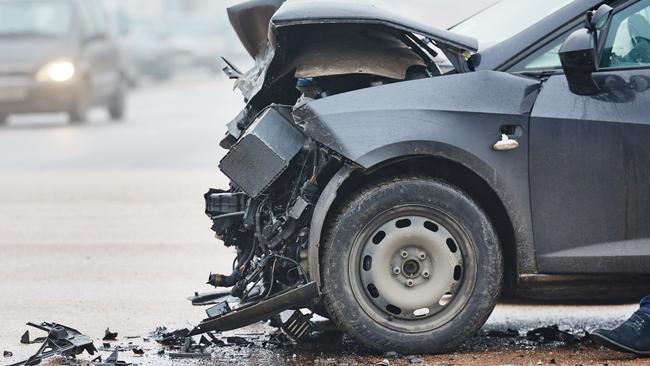 car crash accident on street, damaged automobiles after collision in city