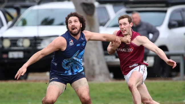 Glenunga superstar Abe Davis battles Prince Alfred's Mackenzie Slee. Picture: Max Stapleton