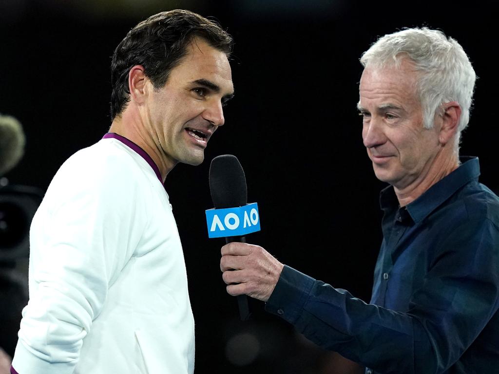 Roger Federer with Johnny Mac.