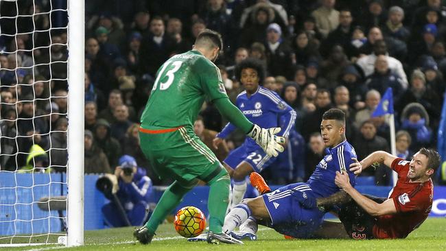 Chelsea's Kenedy (C) scores a goal past West Brom's goal keeper Boaz Myhill.