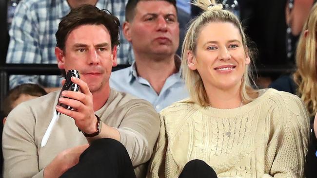 Lauren Jackson and Justin “Kosi” Koschitzke watching an NBL game between Melbourne United and Sydney Kings on October 9. Picture: Getty