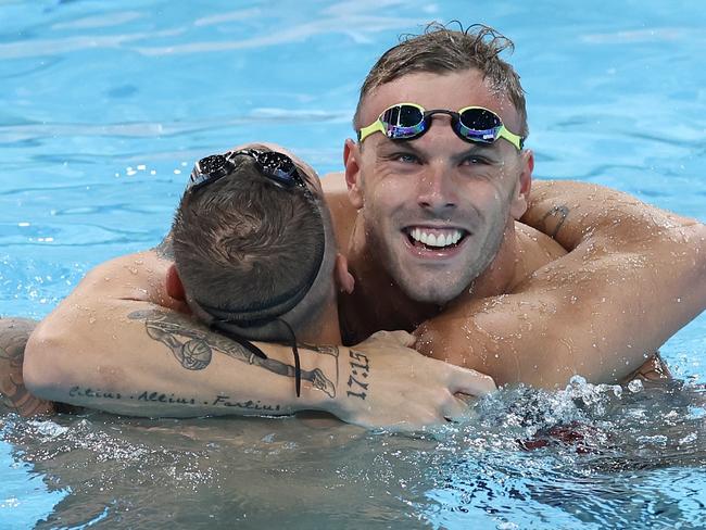 NANTERRE, FRANCE - JULY 27: Kyle Chalmers of Team Australia and Caeleb Dressel of Team United States celebrate after winning silver and gold in the Men's 4x100m Freestyle Relay Final on day one of the Olympic Games Paris 2024 at Paris La Defense Arena on July 27, 2024 in Nanterre, France. (Photo by Quinn Rooney/Getty Images)