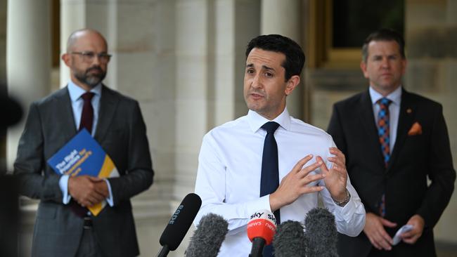 Mr Janetzki, left, fronts the media with LNP leader David Crisafulli, centre, and Deputy Opposition Leader Jarrod Bleijie. Picture: Lyndon Mechielsen