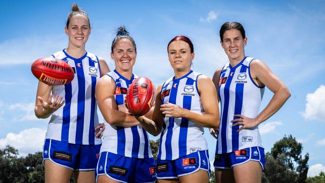 North Melbourne AFLW players Kim Rennie, Emma Kearney, Jenna Bruton and Libby Birch all tasted premiership success for the Western Bulldogs against Brisbane in 2018. Picture: Jake Nowakowski