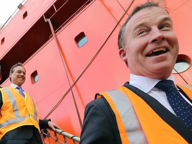 new Icebreaker to replace the Aurora Australia. Will Hodgman, left, Australian Antarctic Division operations manager Robb Clifton, David Bushby, Matt Groom and Greg Hunt and Eric Hutchinson speaking to Aurora Australis chief mate Gerry O'Doherty