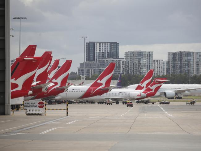 Grounded Qantas planes at the Sydney international airport. Picture: Christian Gilles