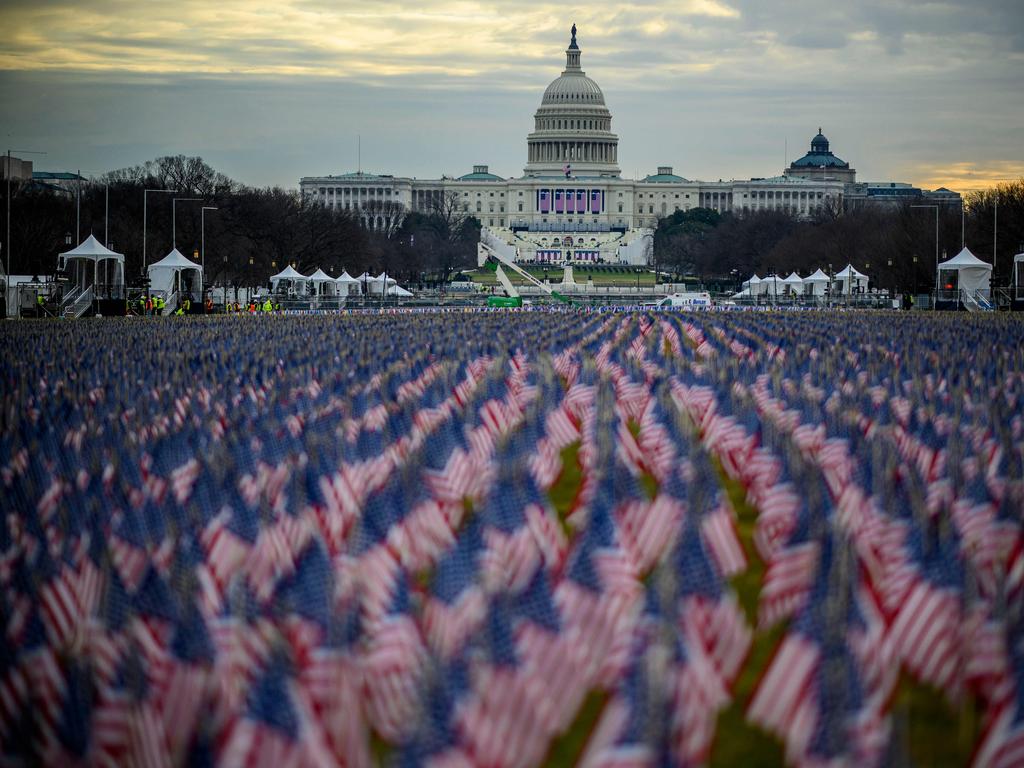 Thousands of flags creating a “field of flags” are seen on the National Mall ahead of Joe Biden's swearing-in inauguration ceremony as the 46th US president in Washington DC. Picture: AFP