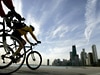 Cyclists beside Lake Michigan/AP