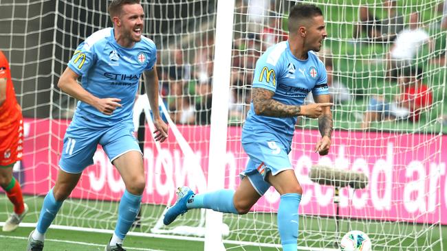 Jamie Maclaren celebrates scoring the opening for City against United Picture: Getty Images