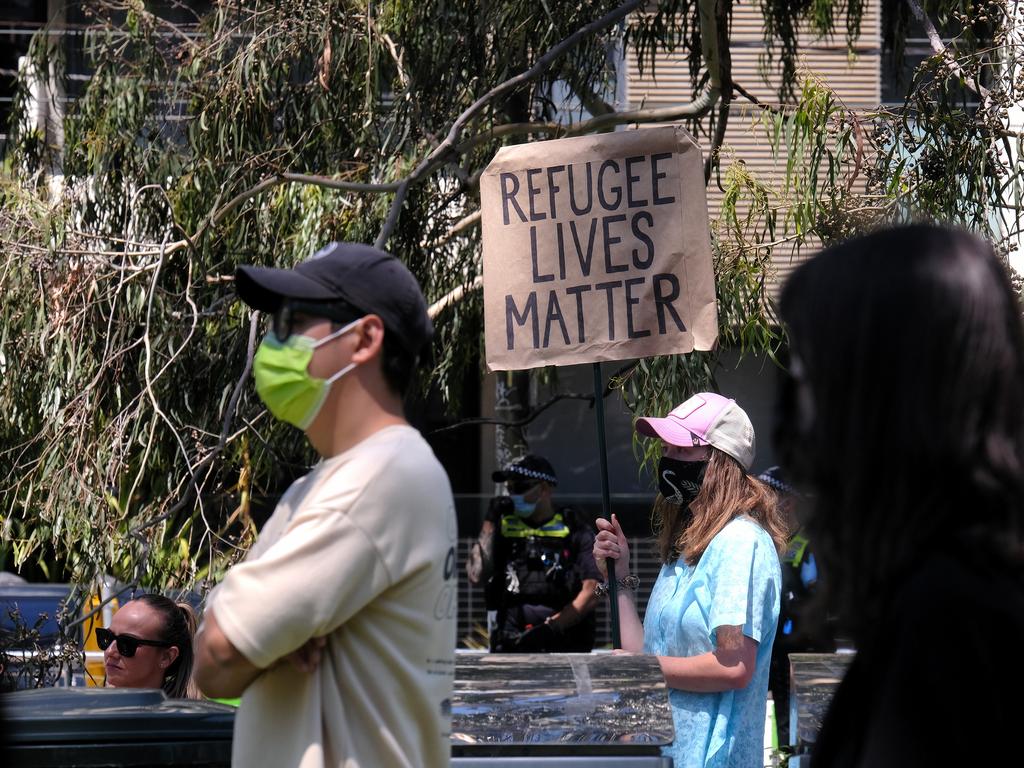 Refugee supporters rallied outside the Park Hotel in Carlton during the Djokovic saga. Picture: NCA NewsWire/Luis Enrique Ascui