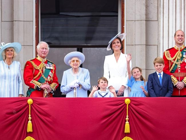 The "working royals" on the balcony of Buckingham Palace watch the RAF flypast during the Trooping the Colour parade.