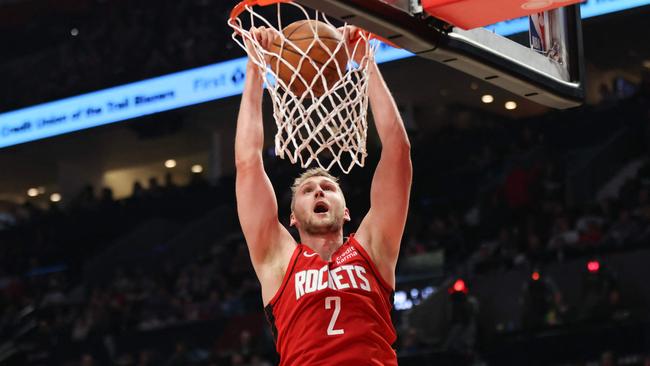 PORTLAND, OREGON - APRIL 12: Jock Landale #2 of the Houston Rockets dunks against the Portland Trail Blazers during the second quarter at Moda Center on April 12, 2024 in Portland, Oregon. NOTE TO USER: User expressly acknowledges and agrees that, by downloading and or using this photograph, User is consenting to the terms and conditions of the Getty Images License Agreement.Â    Amanda Loman/Getty Images/AFP (Photo by Amanda Loman / GETTY IMAGES NORTH AMERICA / Getty Images via AFP)