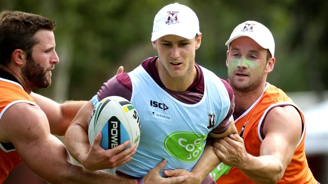 Daly Cherry-Evans tackled during the Manly Warringah Sea Eagles training camp at The Novatel Pacific Bay resort ,Coffs Harbour .Picture Gregg Porteous