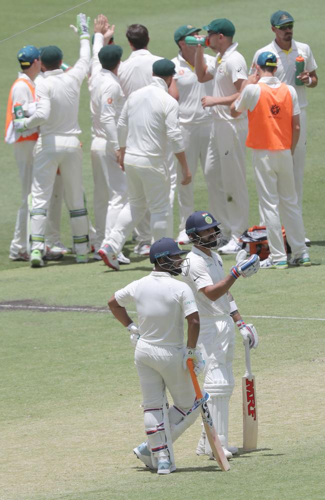 Kohli argues after the catch. (AAP Image/Richard Wainwright) 