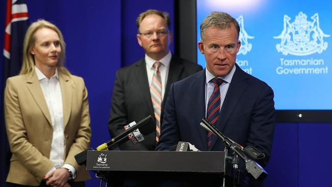 Premier Will Hodgman, right, unveils his new Cabinet with Sarah Courtney, left, and Roger Jaensch at the Executive Building in Hobart. Picture: SAM ROSEWARNE