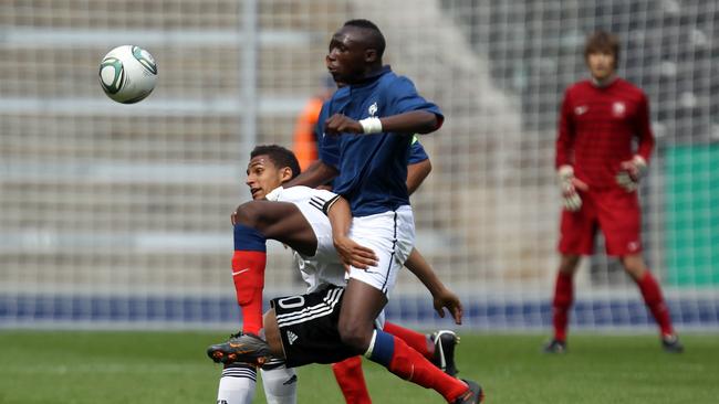 BERLIN, GERMANY - MAY 25: Hany Mukhtar (L) of Germany and Seko Fofana (R) of France battle for the ball during the international friendly match between the U 16 teams of Germany and France at Olympic stadium on May 25, 2011 in Berlin, Germany. (Photo by Martin Rose/Bongarts/Getty Images)