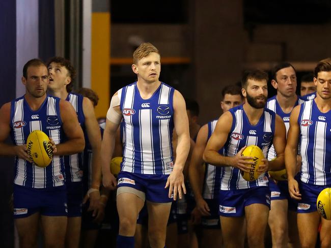 MELBOURNE, AUSTRALIA - APRIL 11: Jack Ziebell of the Kangaroos leads his team up the race during the 2021 AFL Round 04 match between the North Melbourne Kangaroos and the Adelaide Crows at Marvel Stadium on April 11, 2021 in Melbourne, Australia. (Photo by Michael Willson/AFL Photos via Getty Images)
