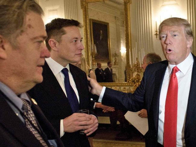 Trump adviser Steve Bannon (left), entrepreneur Elon Musk and Donald Trump. Picture: AFP