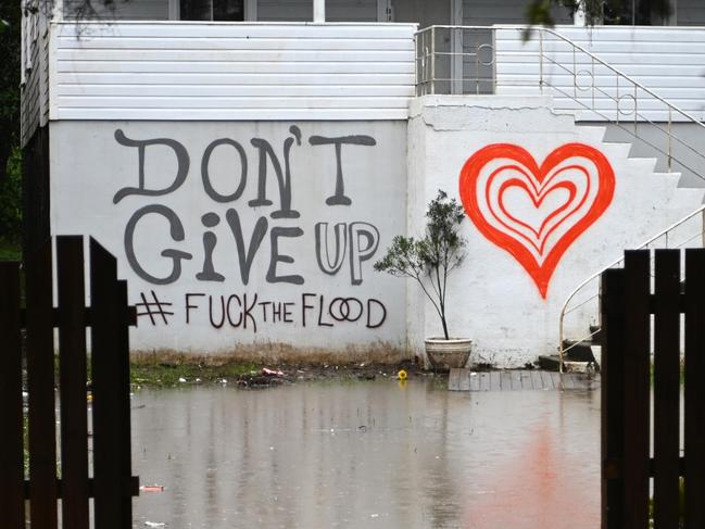 LISMORE, AUSTRALIA - MARCH 29: Floodwater surround a house on March 29, 2022 in Lismore, Australia. Evacuation orders have been issued for towns across the NSW Northern Rivers region, with flash flooding expected as heavy rainfall continues. It is the second major flood event for the region this month. (Photo by Dan Peled/Getty Images)