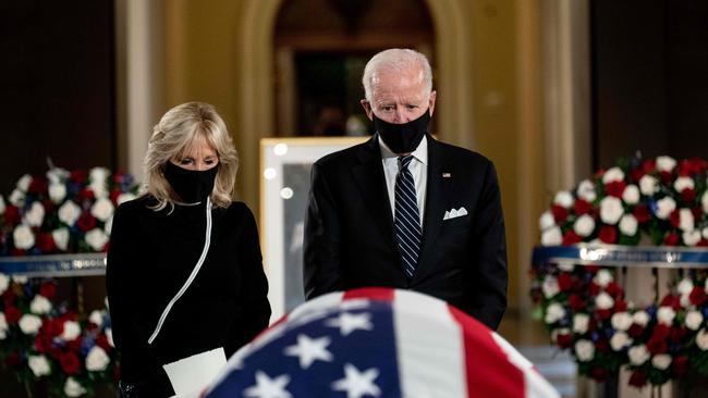 Jill and Joe Biden pay their respects to Ruth Bader Ginsburg as she lies in state at the US Capitol on Saturday, Picture: AFP