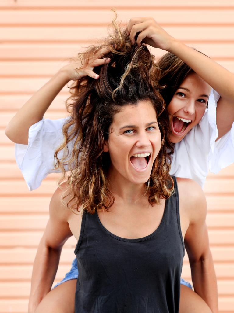 Amy Van den Akker and Steph Dunson ham it up for the camera during the January school holidays Photo Scott Powick