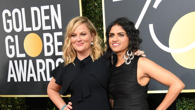 Amy Poehler and Restaurant Opportunities Center United president Saru Jayaraman. Picture: AFP