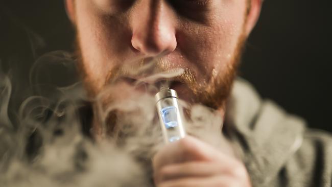 E-cigarettes, at a fraction of the price of a normal cigarette, are becoming increasingly popular. Photo: Mark Cranitch.