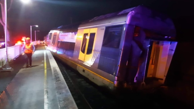 The front carriage rolled onto its side while the second was partially derailed after colliding with an abandoned van on the track last Wednesday. Picture: FRNSW