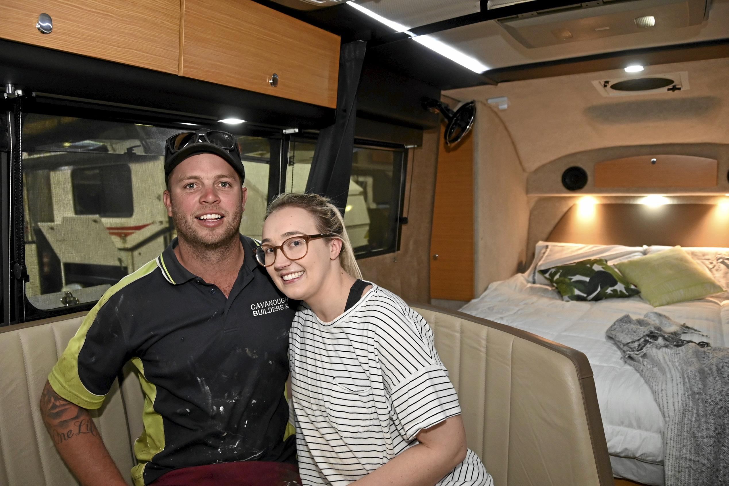 Blake and Kate McAuliffe try the dining experience inside a caravan at the Queensland Outdoor Adventure and Motoring Expo.  August 2019. Picture: Bev Lacey