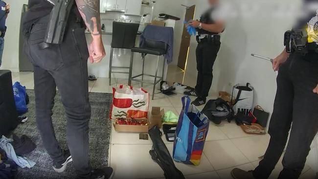 Police allegedly seized drugs, cash, and weapons in the raids at Surfers Paradise and Biggera Waters. Picture: QPS